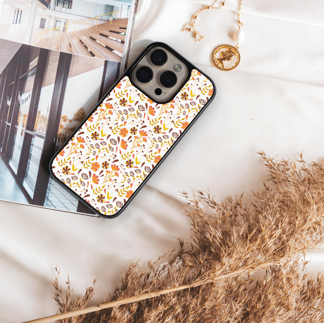 Fall floral iPhone case with autumn flowers pattern in orange, yellow, and brown colors – cute and aesthetic protective cover for iPhone models.