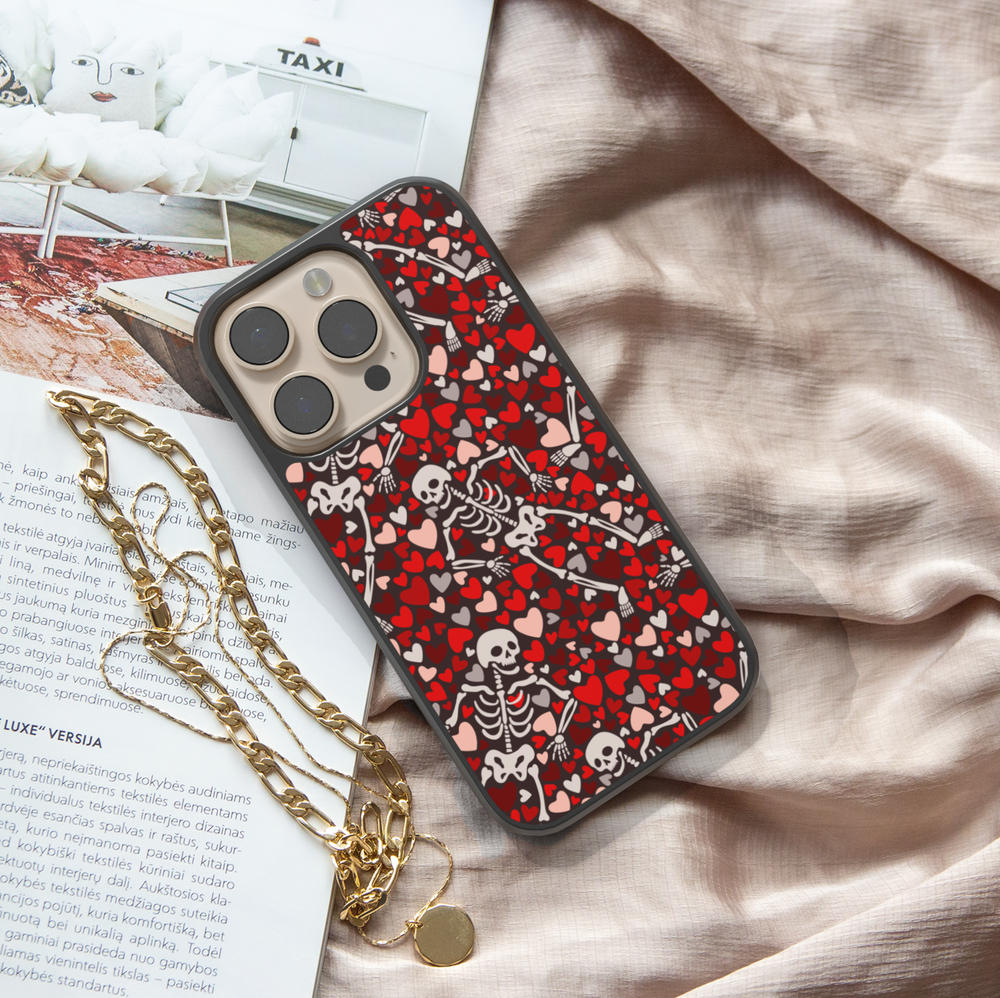 Hearts Skeleton iPhone Case, Halloween iPhone cover with spooky skeletons and pumpkin heads, cute gothic phone case with black background, protective fall phone case, stylish skeleton iPhone cover