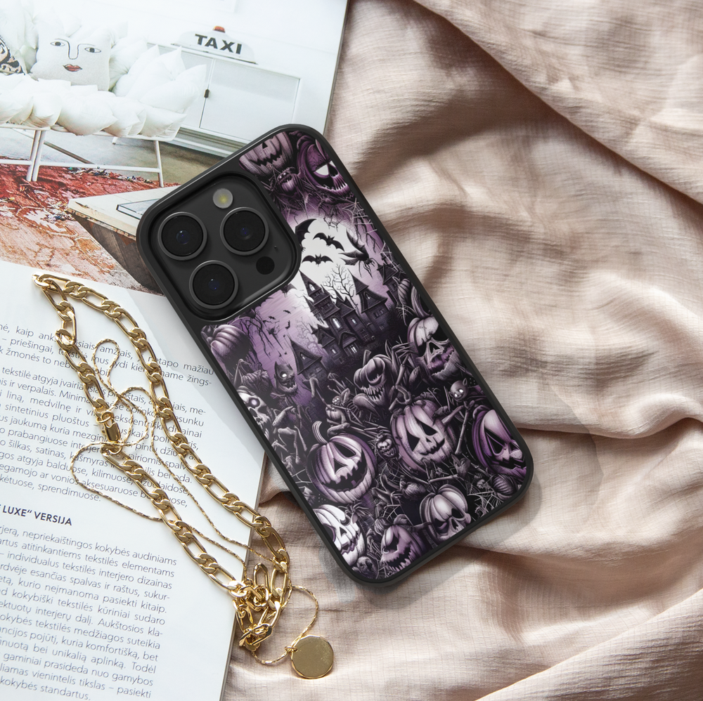 Halloween iPhone case with haunted mansion design, purple gothic background, creepy jack-o’-lantern pumpkins, bats, cobwebs, skulls, and eerie spooky graveyard pattern – protective shockproof phone cover for iPhone