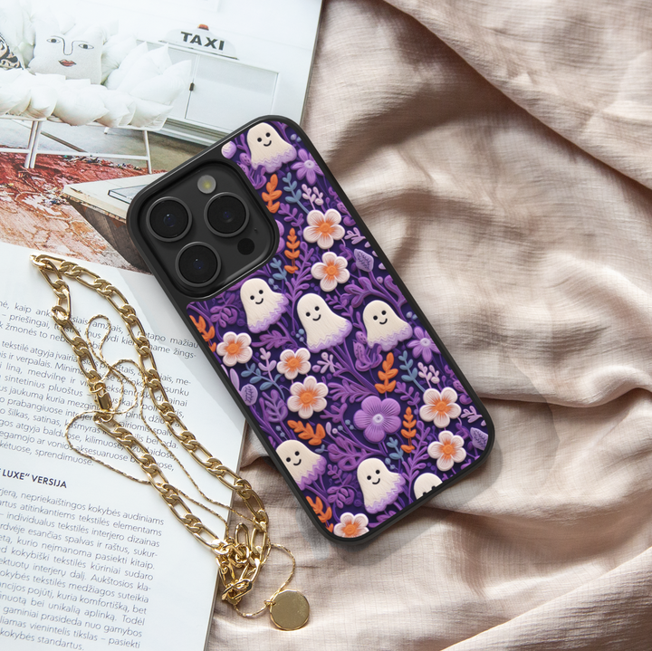 Pastel floral ghost phone case with cute kawaii ghost design and colorful flowers – girly Halloween aesthetic cover for iPhone and Samsung.