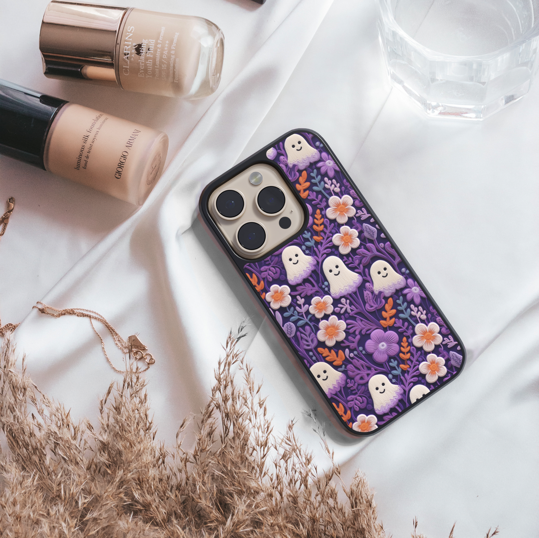 Pastel floral ghost phone case with cute kawaii ghost design and colorful flowers – girly Halloween aesthetic cover for iPhone and Samsung.