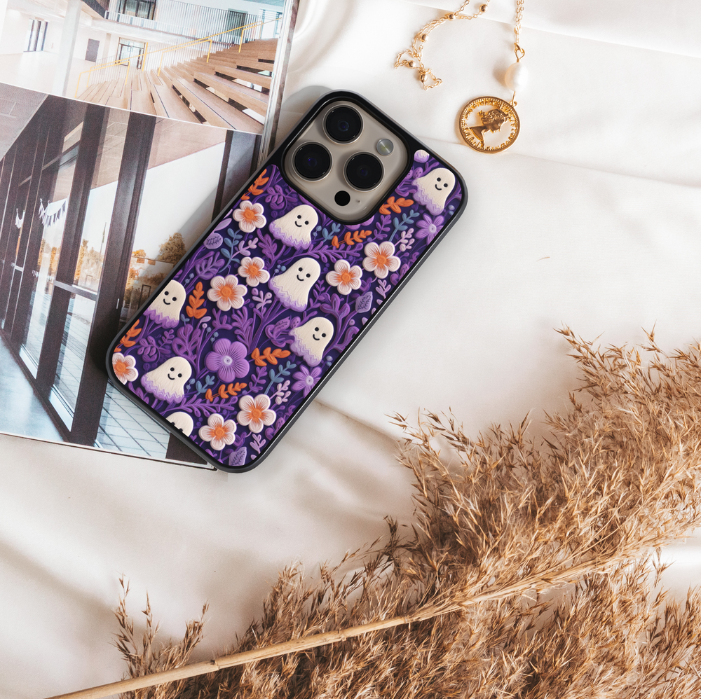Pastel floral ghost phone case with cute kawaii ghost design and colorful flowers – girly Halloween aesthetic cover for iPhone and Samsung.