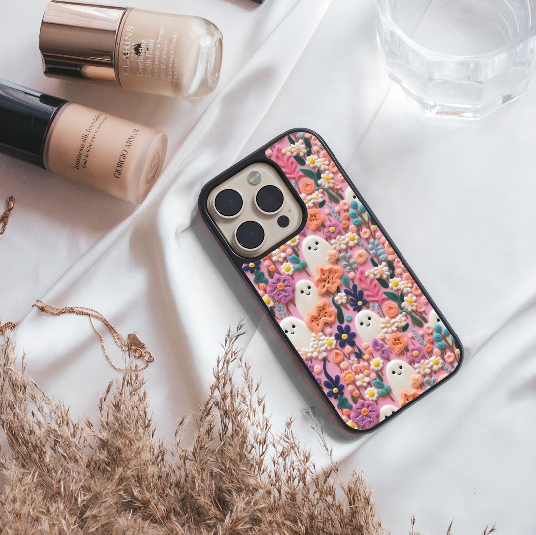 Pastel floral ghost phone case with cute kawaii ghost design and colorful flowers – girly Halloween aesthetic cover for iPhone and Samsung