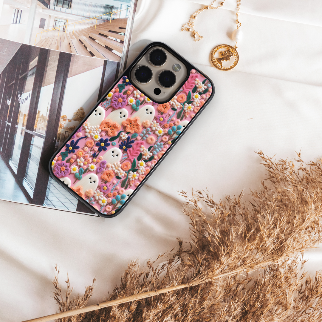 Pastel floral ghost phone case with cute kawaii ghost design and colorful flowers – girly Halloween aesthetic cover for iPhone and Samsung