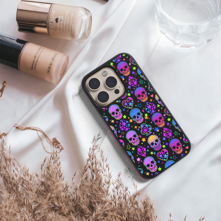 Halloween iPhone case with glowing pumpkins, jack-o’-lantern forest design, spooky purple trees, haunted night sky, protective phone cover for iPhone, aesthetic fall and Halloween accessory.
