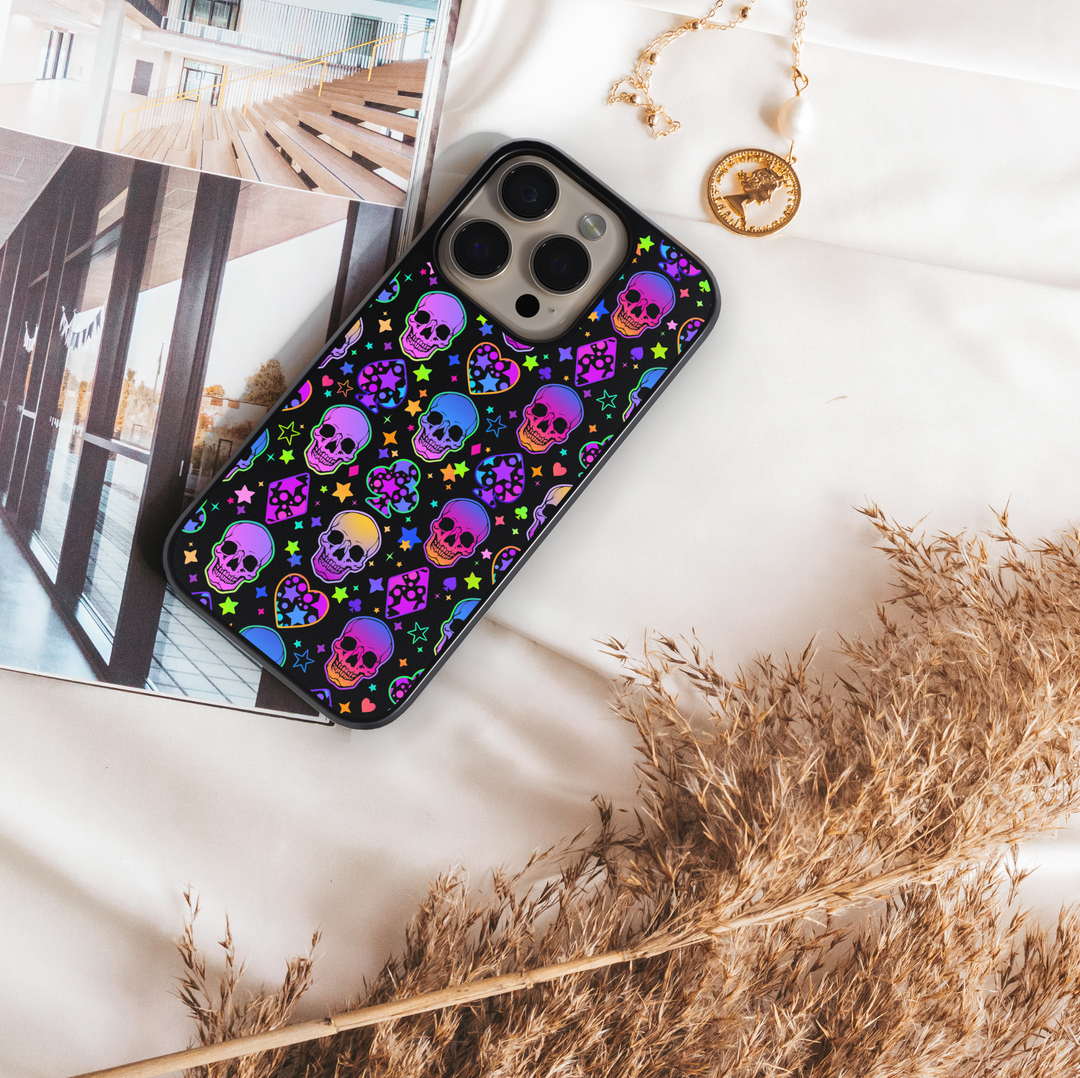 Halloween iPhone case with glowing pumpkins, jack-o’-lantern forest design, spooky purple trees, haunted night sky, protective phone cover for iPhone, aesthetic fall and Halloween accessory.