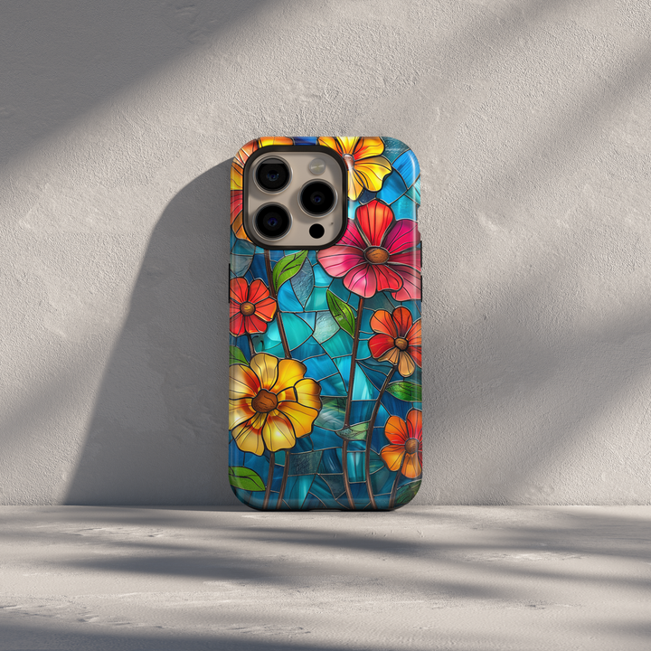 Colorful stained glass floral iPhone case with vibrant flowers and blue glass background