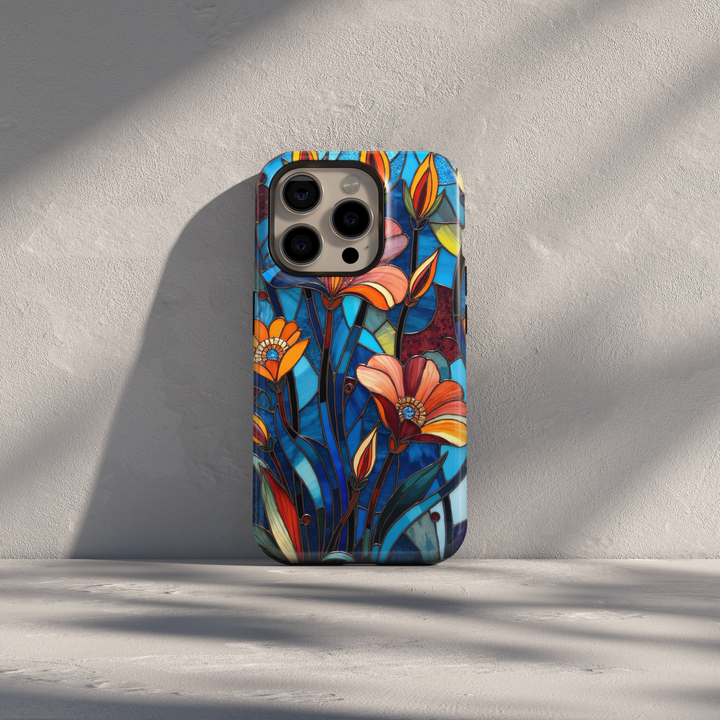 Stained glass floral iPhone case with blue background and orange wildflowers