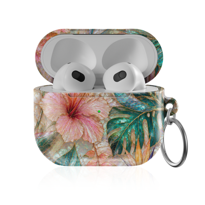 Tropical floral AirPods case featuring pink hibiscus flowers, teal monstera leaves, exotic blooms, and pearl-inspired island artwork.