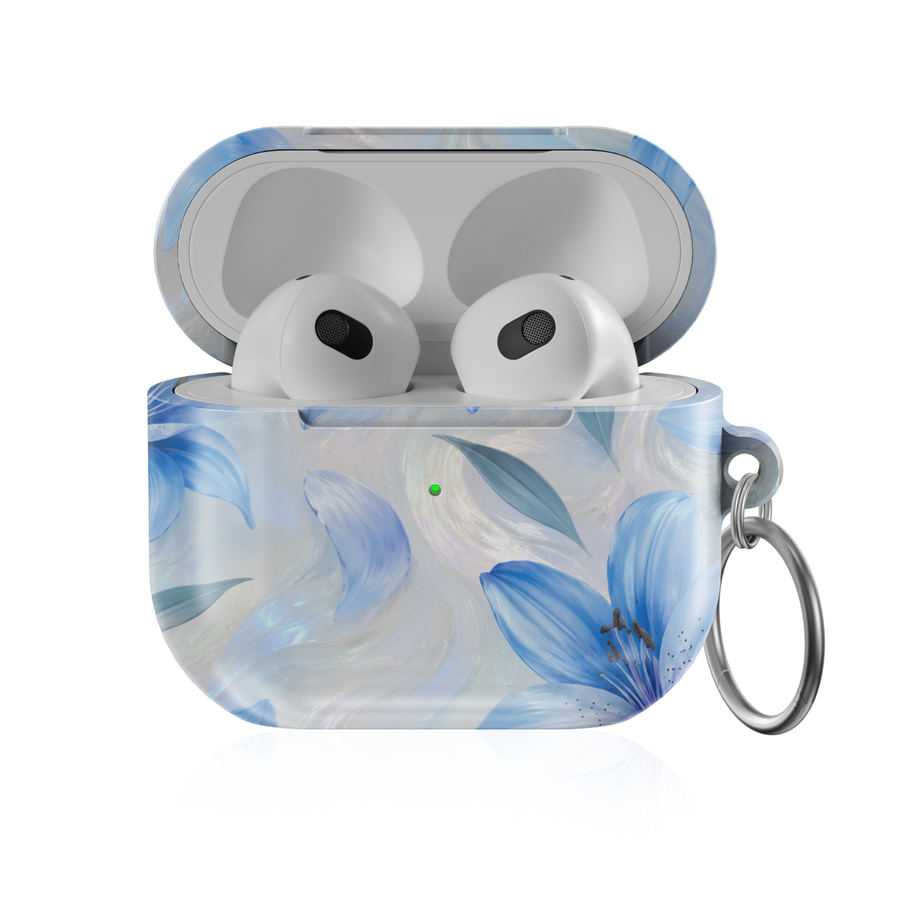 Blue lily AirPods case featuring delicate sapphire-blue flowers on an iridescent pearl-inspired background.