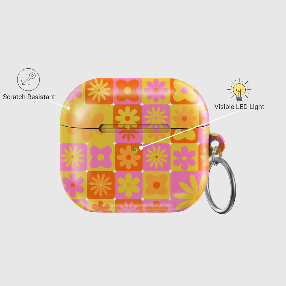 Retro floral AirPods case with colorful orange, yellow, and pink flower checkerboard pattern – 70s inspired cover with keychain for AirPods 3rd Gen.