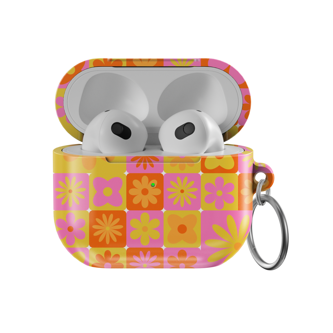 Retro floral AirPods case with colorful orange, yellow, and pink flower checkerboard pattern – 70s inspired cover with keychain for AirPods 3rd Gen.