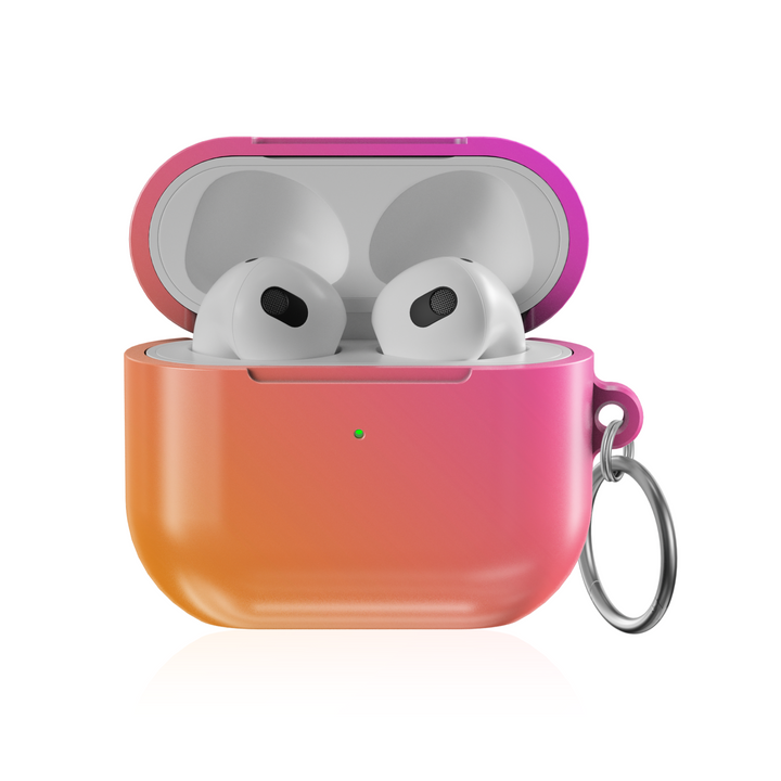 Glossy ombre AirPods case in pink and orange gradient with silver keychain ring

