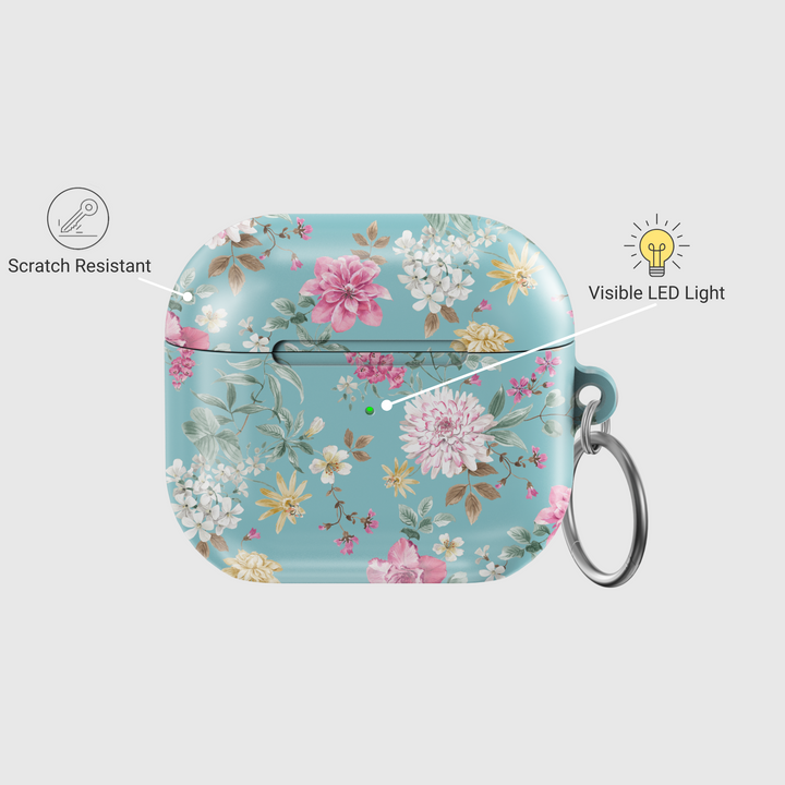 Teal AirPods case with pink, white, and yellow wildflowers, aesthetic floral protective AirPods Pro and Gen 1 2 3 cover with attached silver keyring

