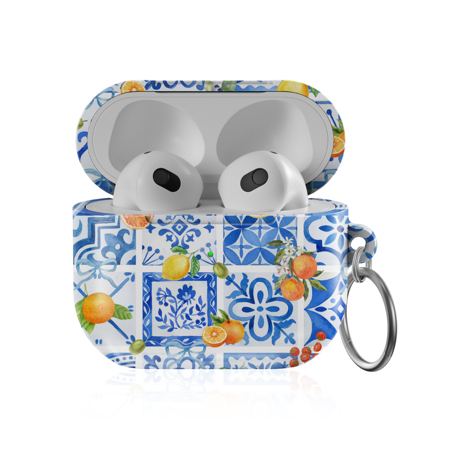 AirPods case with blue tile Mediterranean print and citrus fruit design, silver keychain ring attached


