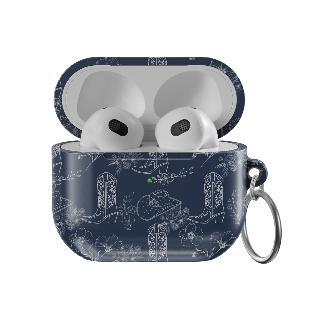 Western-themed AirPods case in matte navy with cowboy boot and floral illustrations | Cowgirl aesthetic protective AirPods cover with keychain

