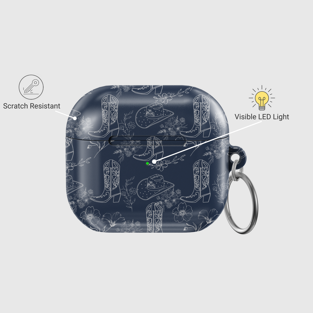 Western-themed AirPods case in matte navy with cowboy boot and floral illustrations | Cowgirl aesthetic protective AirPods cover with keychain

