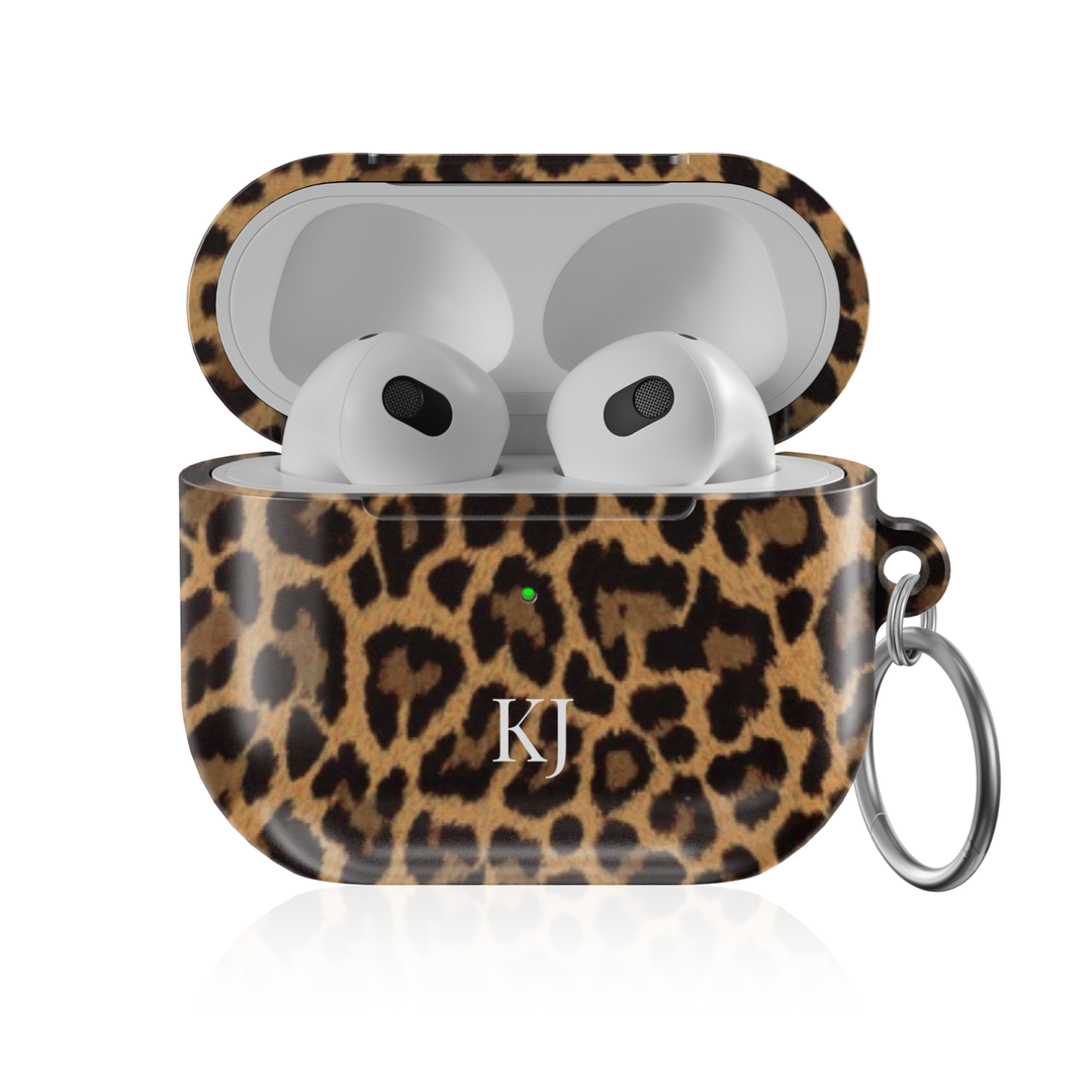 Personalized AirPods Pro case with classic leopard print pattern and custom initials, glossy protective AirPods charging case cover with keyring