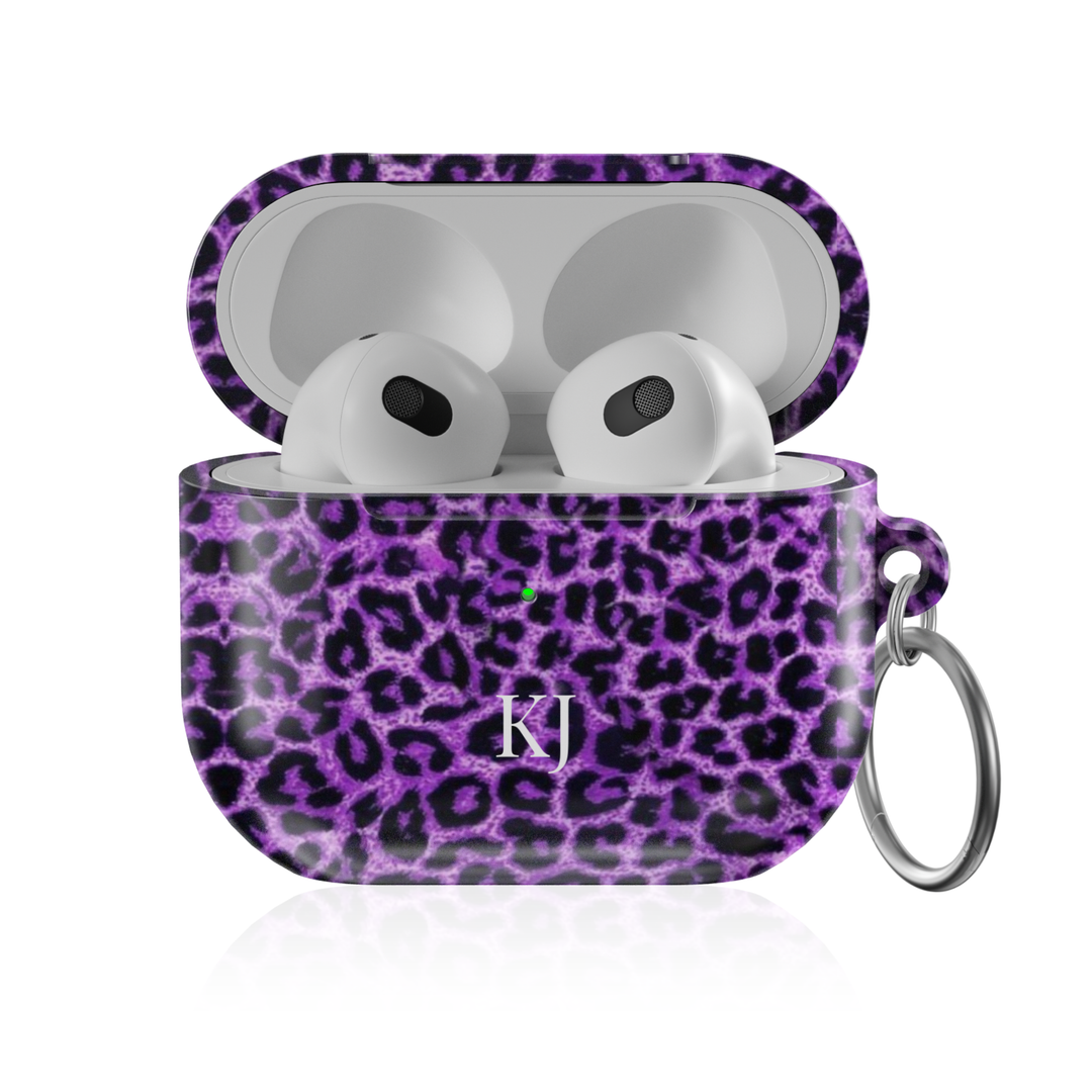 Personalized AirPods Pro case with purple leopard print pattern and custom initials, glossy protective AirPods charging case cover with keyring
