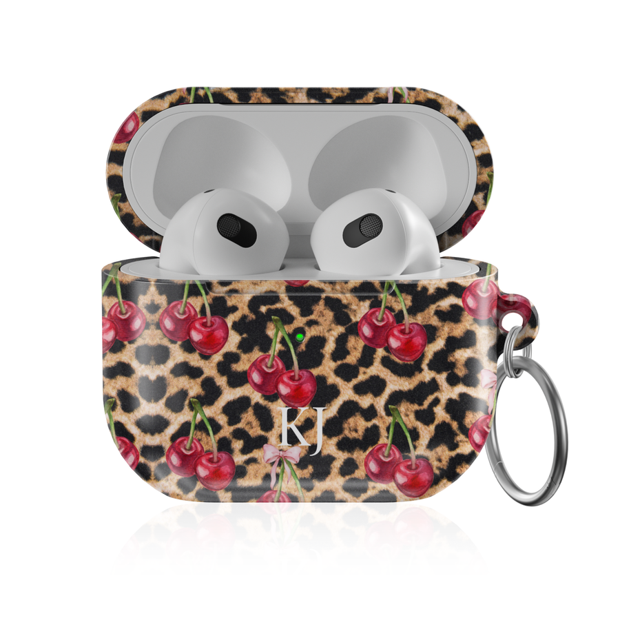 Personalized AirPods Pro case with cherry leopard print pattern and custom initials, glossy protective AirPods charging case cover with keyring