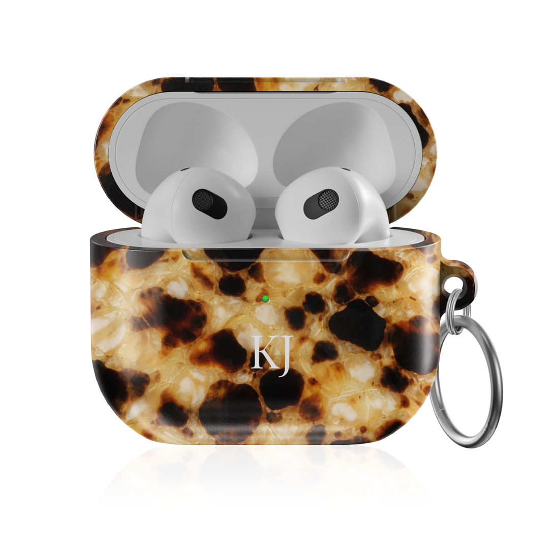 Personalized AirPods Pro case with light tortoise shell pattern and custom initials, glossy protective AirPods charging case cover with keyring