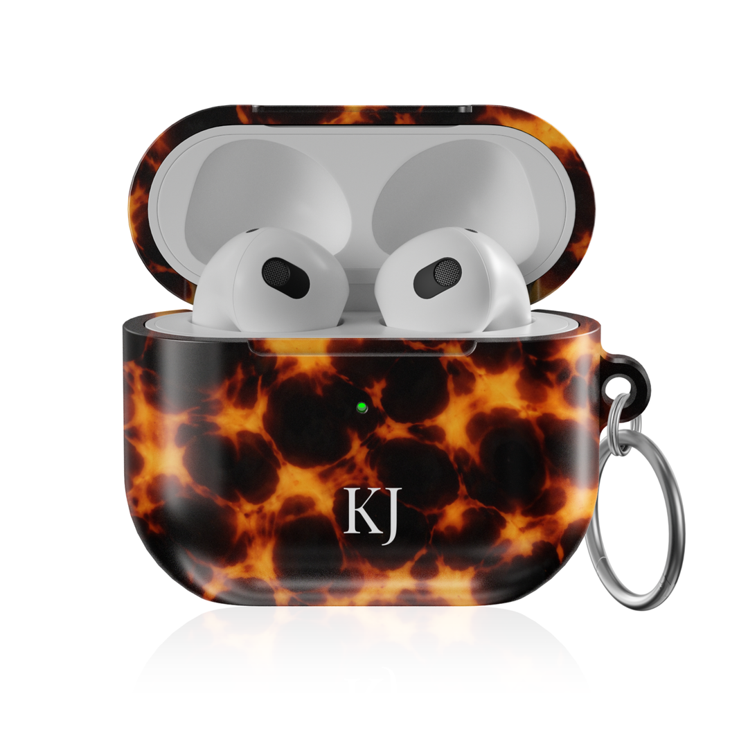 Personalized AirPods Pro case with fiery tortoise shell pattern and custom initials, glossy protective AirPods charging case cover with keyring