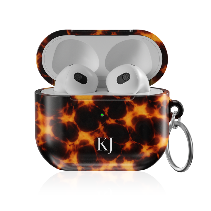 Personalized AirPods Pro case with fiery tortoise shell pattern and custom initials, glossy protective AirPods charging case cover with keyring