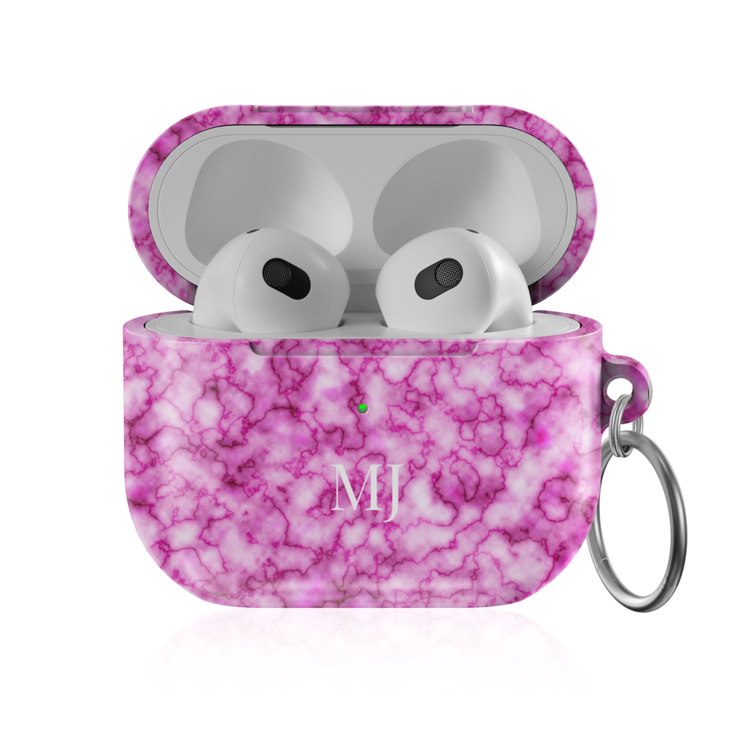Personalized AirPods Pro case with soft pink marble pattern and custom initials, glossy protective AirPods charging case cover with keyring