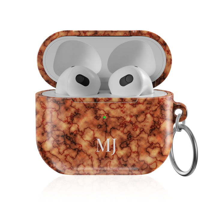 Personalized AirPods Pro case with warm marble pattern and custom initials, glossy protective AirPods charging case cover with keyring