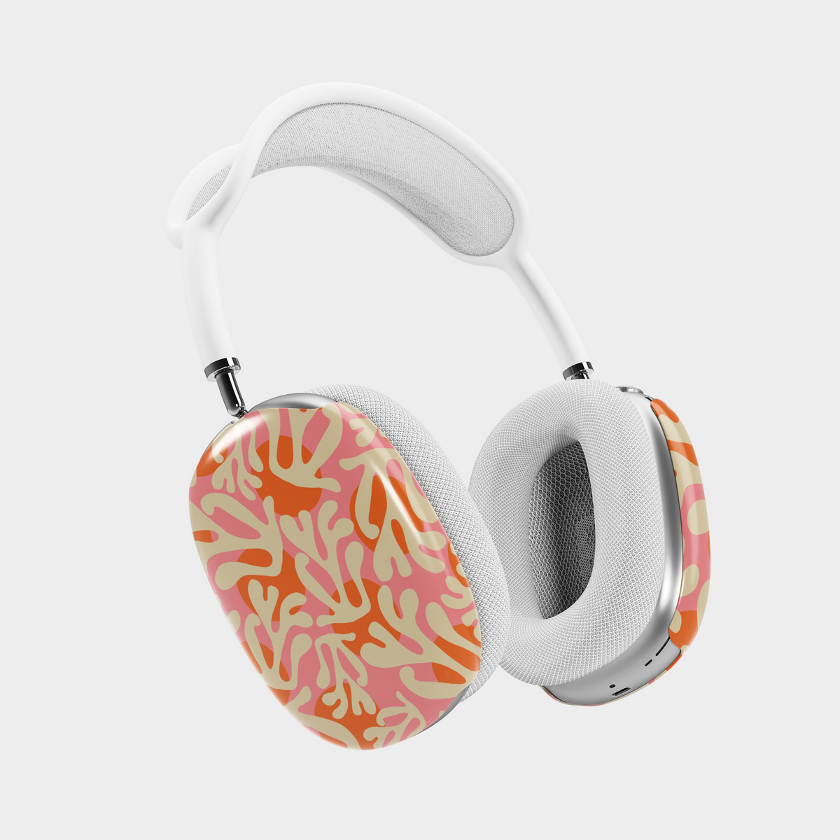 AirPods Max cover with tropical coral reef pattern in pink, orange, and cream – ocean-inspired aesthetic headphone wrap.