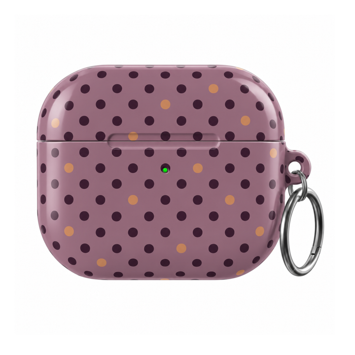 Autumn Confetti AirPods Case featuring a muted mauve background with deep burgundy and warm caramel polka dots and a silver carabiner.