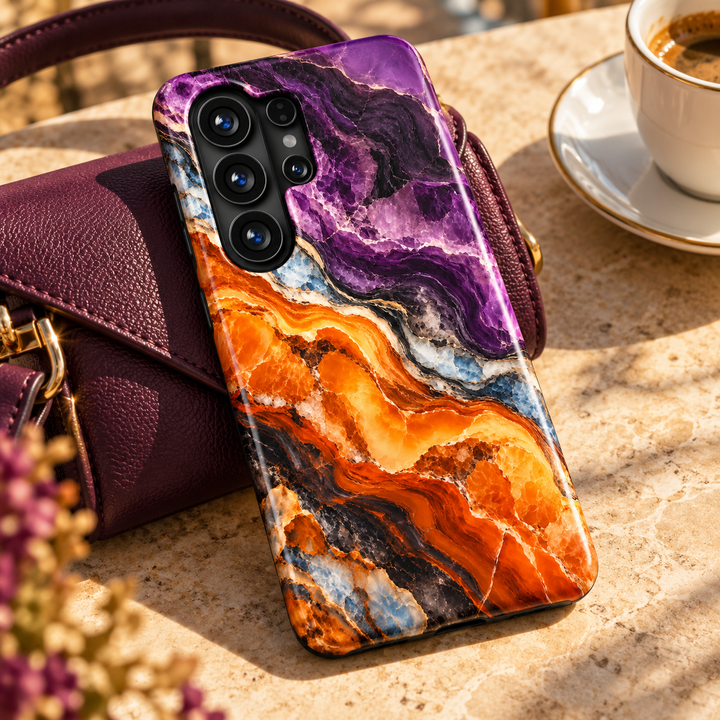 CASELIX Amethyst Amber Samsung Galaxy case with glossy purple, amber orange, black and icy blue marble print on a white background.