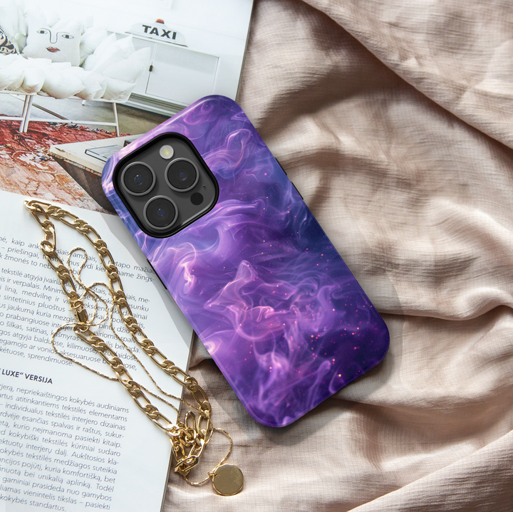 Purple and pink smoke swirl phone case with galaxy sparkles – dreamy aesthetic design compatible with iPhone 16, iPhone 15 Pro Max, Galaxy S24 Ultra, and MagSafe accessories.