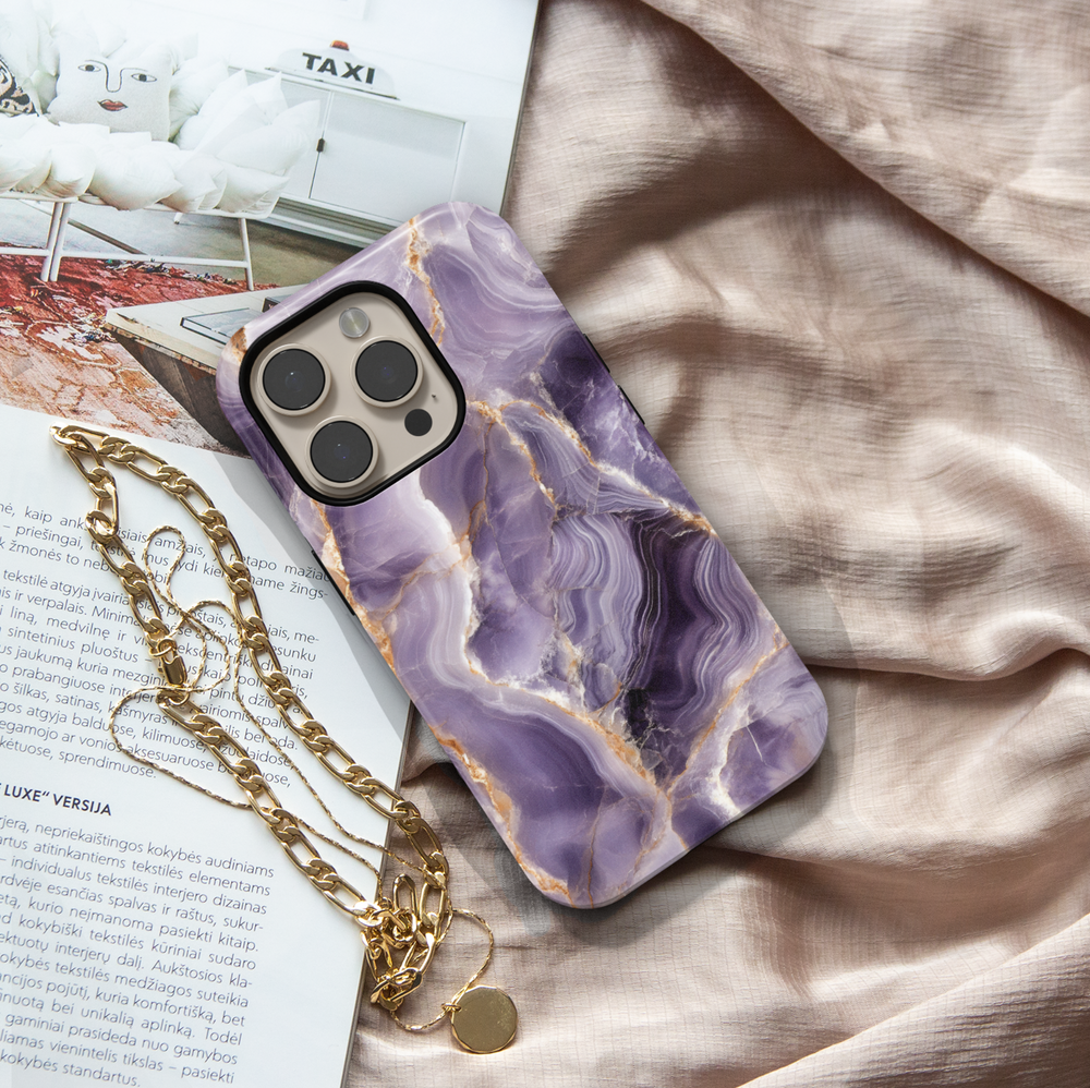 Purple marble iPhone 16 MagSafe case with white and gold veining – luxurious gemstone-inspired phone cover for iPhone models.