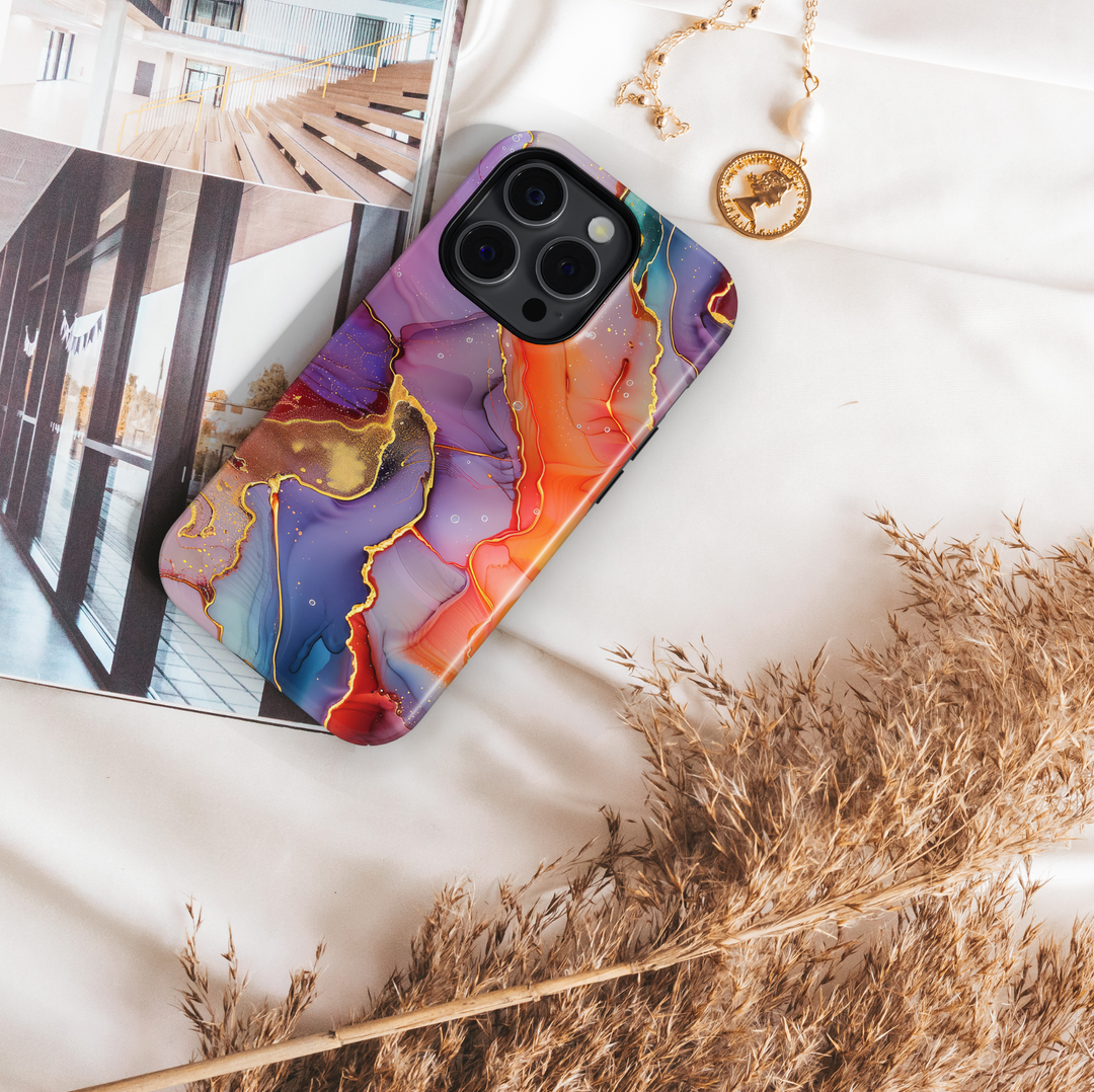 Bold abstract watercolor swirl phone case in orange, purple, teal, and gold – fits iPhone 16 Pro, Galaxy S24 Ultra, iPhone 15 Plus, MagSafe compatible.