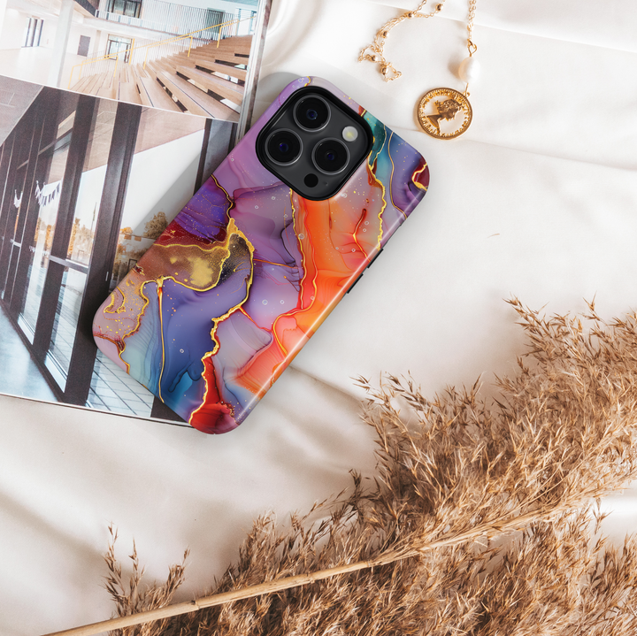 Bold abstract watercolor swirl phone case in orange, purple, teal, and gold – fits iPhone 16 Pro, Galaxy S24 Ultra, iPhone 15 Plus, MagSafe compatible.
