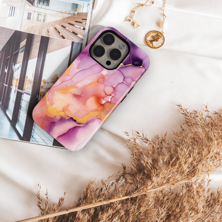 Vibrant pink, purple, and orange watercolor marble phone case – fits iPhone 16 Pro, 15 Plus, Galaxy S24 Ultra, MagSafe compatible.