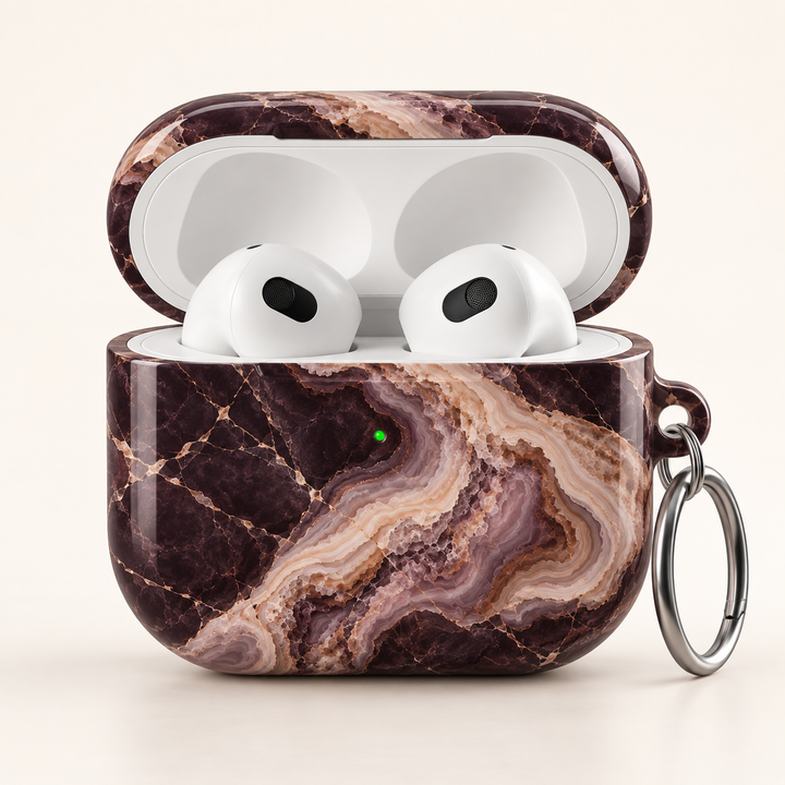 Espresso Veil AirPods Case featuring layered espresso brown, smoky plum, mocha, taupe and cream agate marble with a silver carabiner.