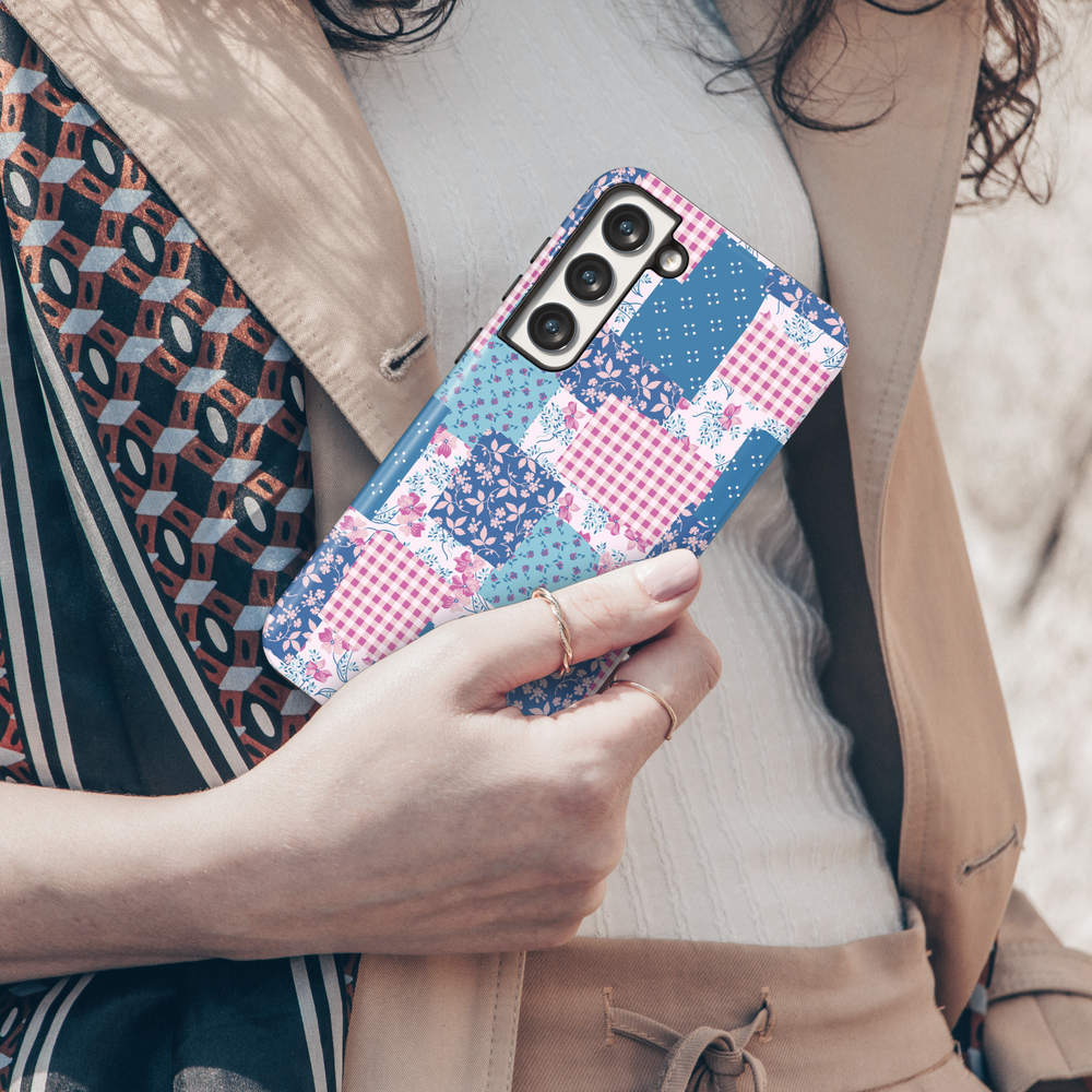 Charming patchwork Samsung Galaxy phone case featuring a vintage-inspired mix of floral, gingham, and polka dot patterns in blue and pink hues. Aesthetic protective cover for Samsung Galaxy S25 Ultra, S24 FE, S23, and more.