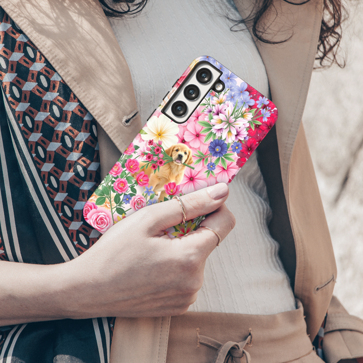 Cute floral Samsung Galaxy S25 Ultra, S24 FE, S24 Ultra phone case featuring a golden retriever holding flowers in a vibrant spring garden. Aesthetic pet lover’s design with colorful flowers.