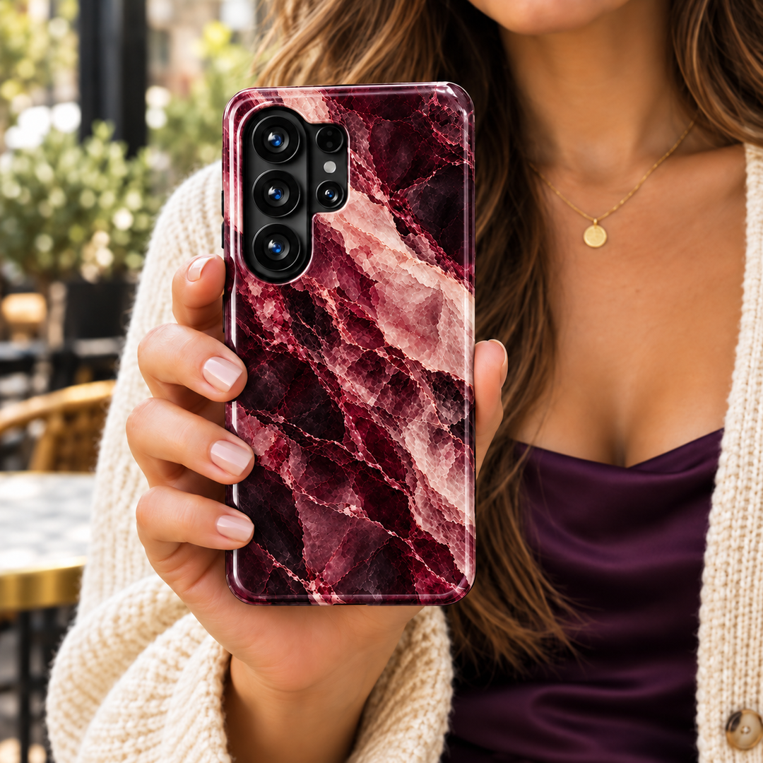 Burgundy Venom Samsung Galaxy case featuring deep wine-red marble with sweeping blush pink and cream veins and a glossy finish.