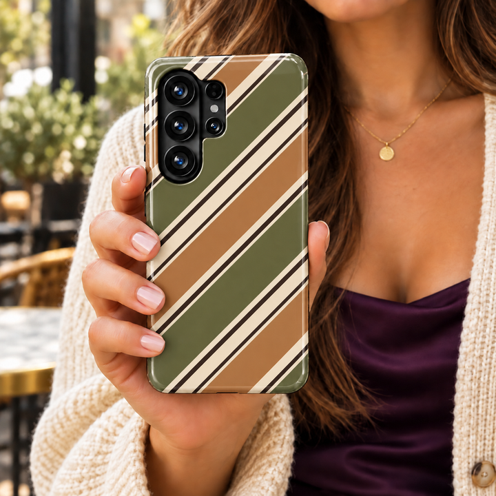 Olive Atelier Samsung Galaxy case featuring broad olive green and caramel diagonal stripes with narrow cream and dark brown accent lines.