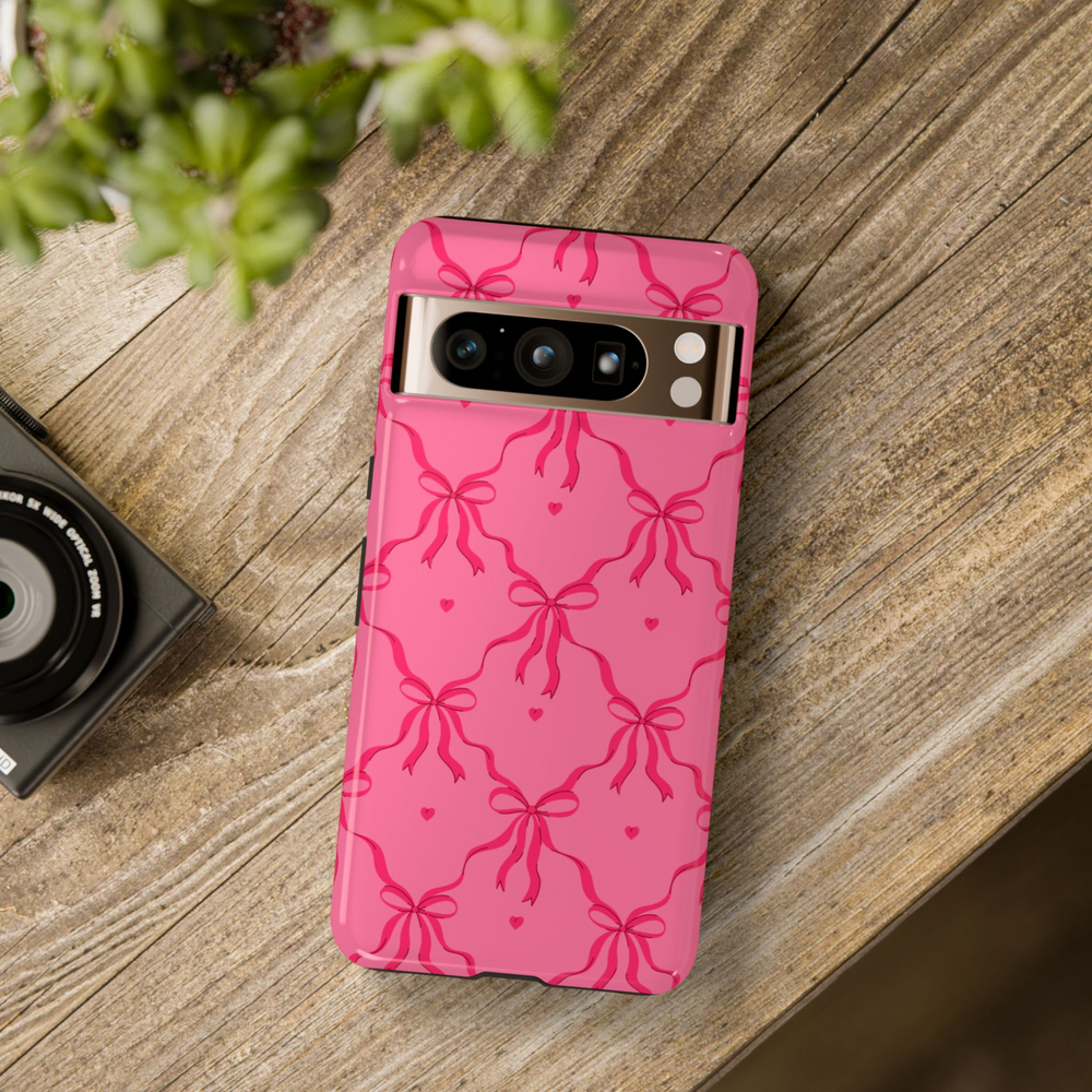 Cute pink Google Pixel tough case with red bow and tiny heart pattern – aesthetic coquette-style cover for Pixel 8, Pixel 8 Pro, Pixel 9 Pro XL