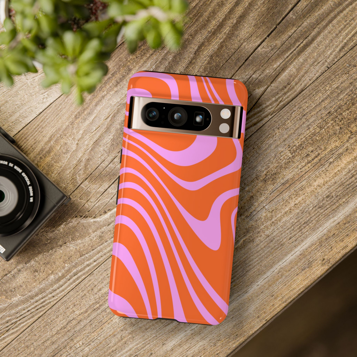 Bold orange and pink abstract swirl tough phone case for Google Pixel 8, Pixel 8 Pro, and Pixel 9 Pro XL with groovy wave design