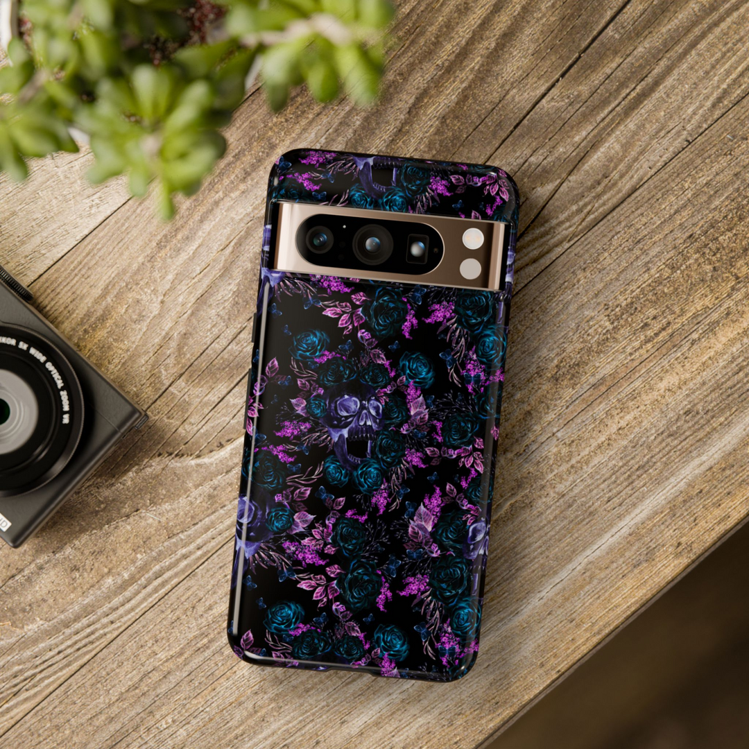 Dark Floral Skull Pattern Phone Case for Google Pixel 9 Pro with Teal Roses and Purple Leaves

