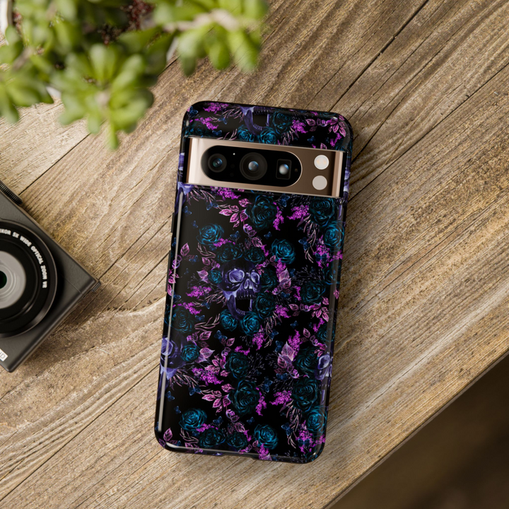 Dark Floral Skull Pattern Phone Case for Google Pixel 9 Pro with Teal Roses and Purple Leaves

