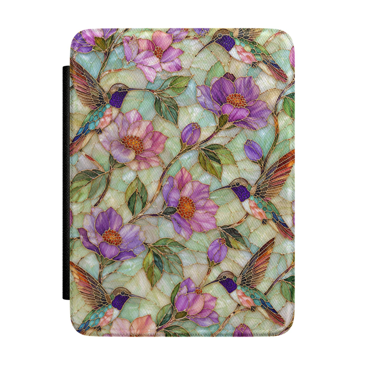 Hummingbird Kindle case featuring colorful hummingbirds, purple flowers, botanical vines, and a soft pastel background on a premium faux leather cover.