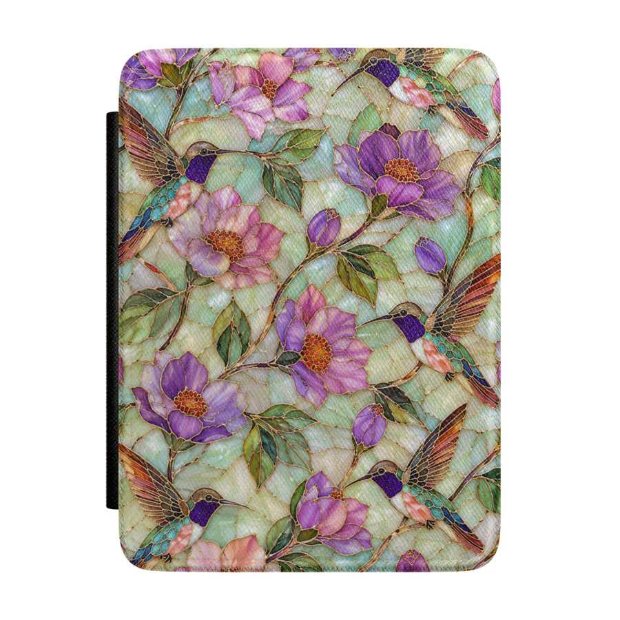 Hummingbird Kindle case featuring colorful hummingbirds, purple flowers, botanical vines, and a soft pastel background on a premium faux leather cover.