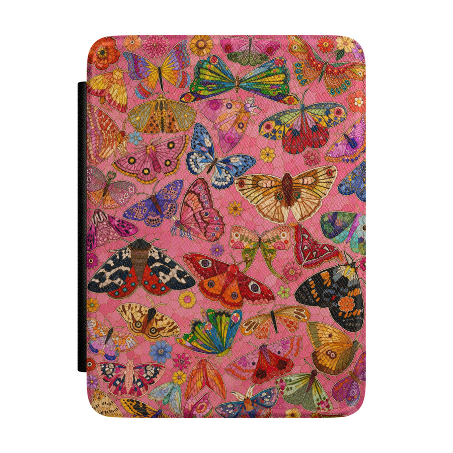 Colorful butterfly Kindle case featuring dozens of detailed butterflies and moths on a vibrant pink floral background with vintage botanical style.