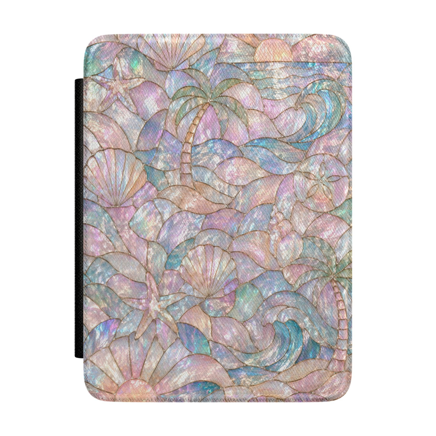 Pastel coastal Kindle case featuring ocean waves, seashells, starfish, palm trees, and shimmering opalescent beach-inspired artwork.